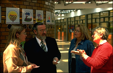 Colombia: Jewish schoolteachers schmooze at Bogotá's Colegio Colombo-Hebreo. An estimated 4,200 Jews live in Colombia, down from over 10,000 in the 1970s. PHOTO BY LARRY LUXNER.
